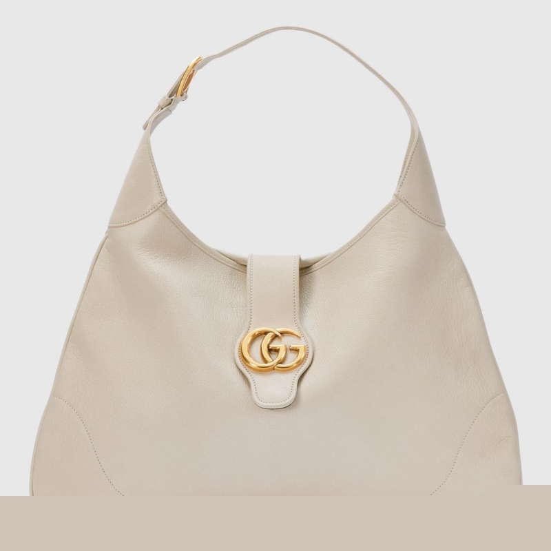 G*u*i top handle bags
